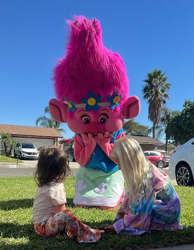Hire Poppy from Trolls for birthday parties - colorful mascot character performer in Fort Lauderdale
